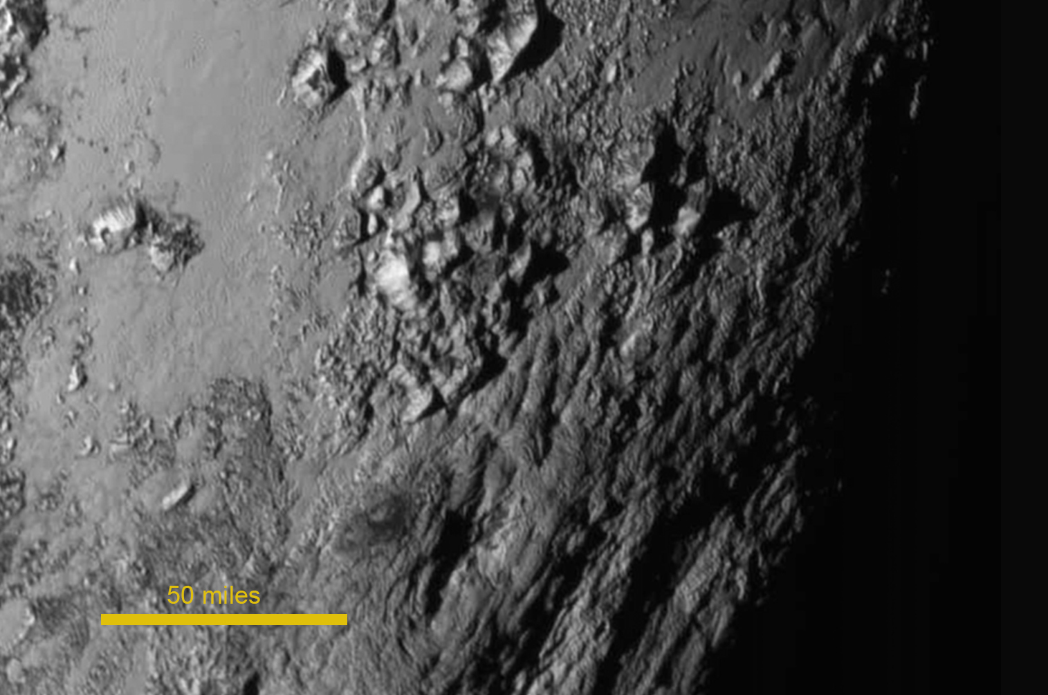 New Photos of Pluto and Moon Surprise, Puzzle Scientists
